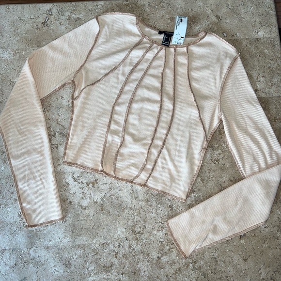 Nude Sunray Seam Ribbed Raw Hem Long Sleeve Crop Shirt - Picture 2 of 6